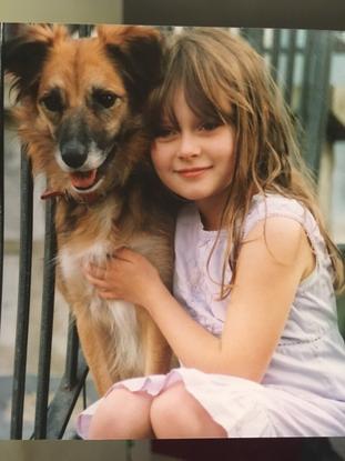 Me and my dog pictured when we had only just got her when I was 7! 