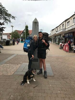 Lola at the starting point of the West Highland Way with my boyd and I.