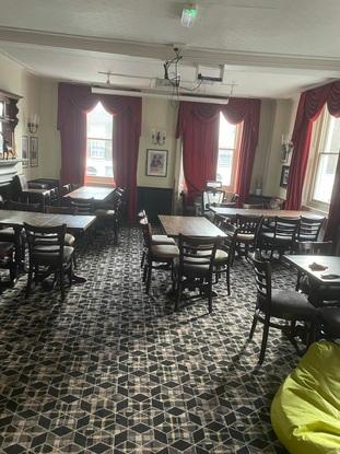 For sitting all the tables and chairs will be moved as my living accommodation also acts as a pub restaurant. I also have a large bedroom for where they can stay.
